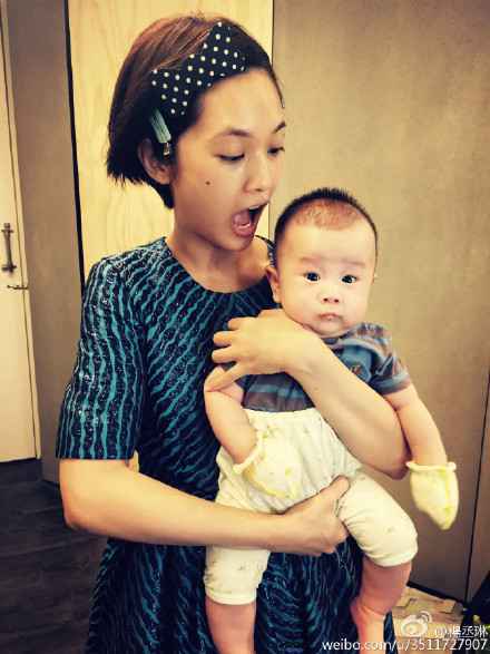 杨丞琳晒抱宝宝照片 网友：快和李荣浩生一个